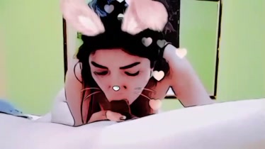 Novia chupando con filtro de conejito