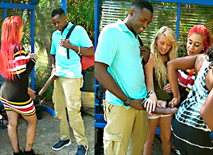 Tres putas acariciando en la calle un gran guebo largo